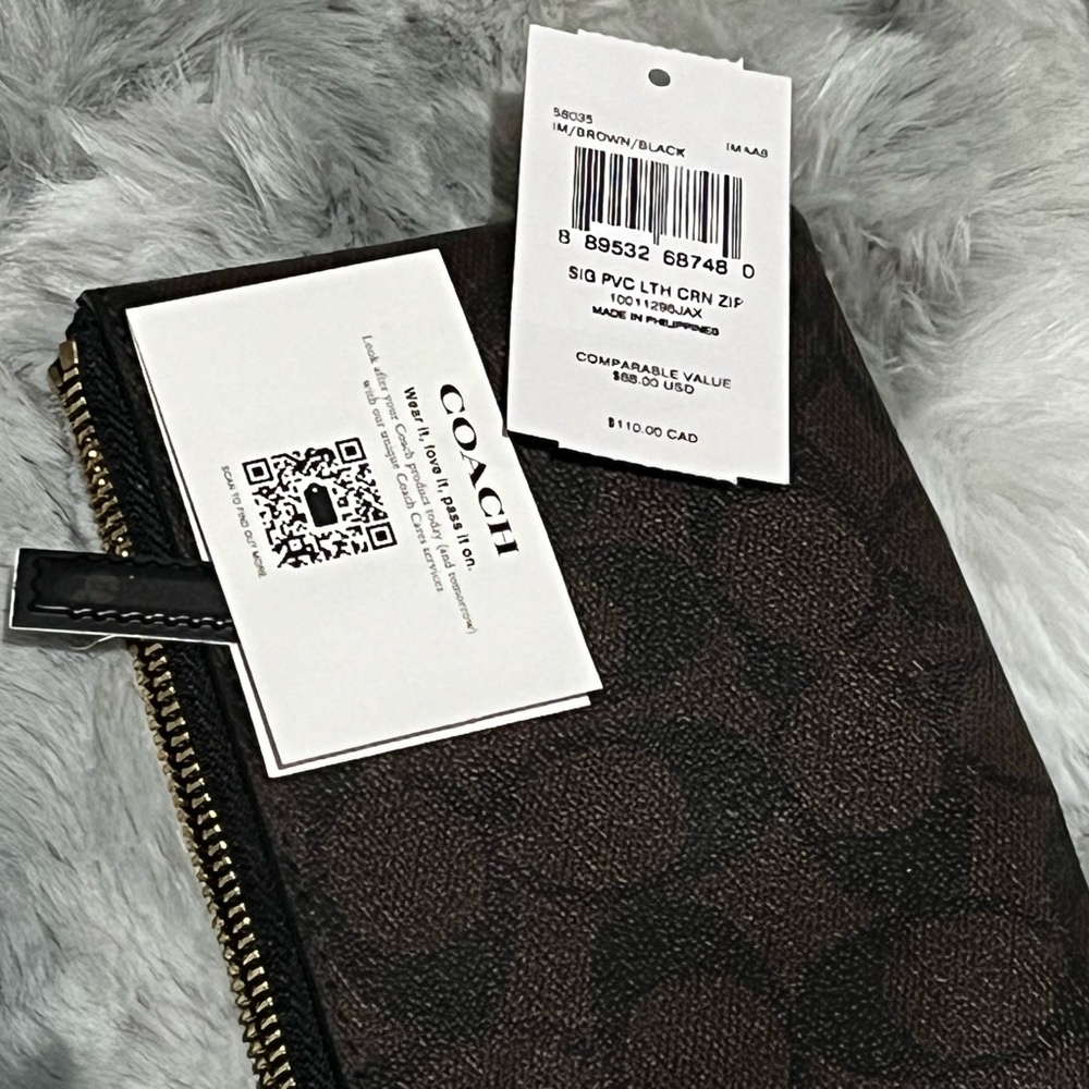 Brand new Coach wristlet authentic